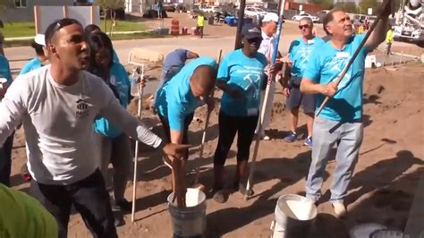 Volunteers work on Habitat for Humanity home for 1st time homeowner in Pompano Beach
